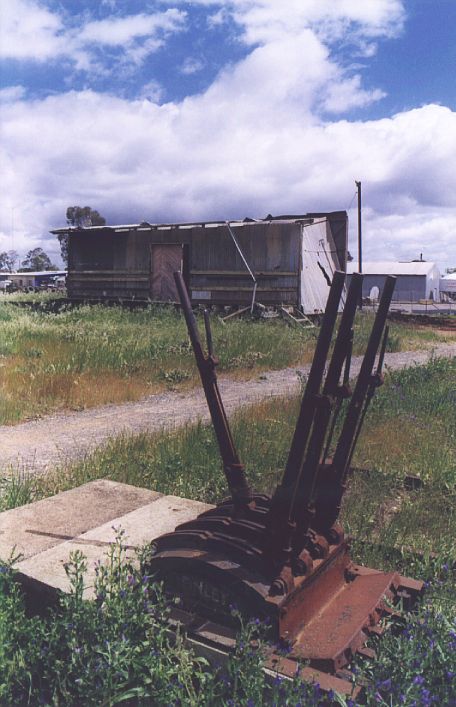 
A lever frame and the remains of the goods shed in Finley yard, so the
south of the station.
