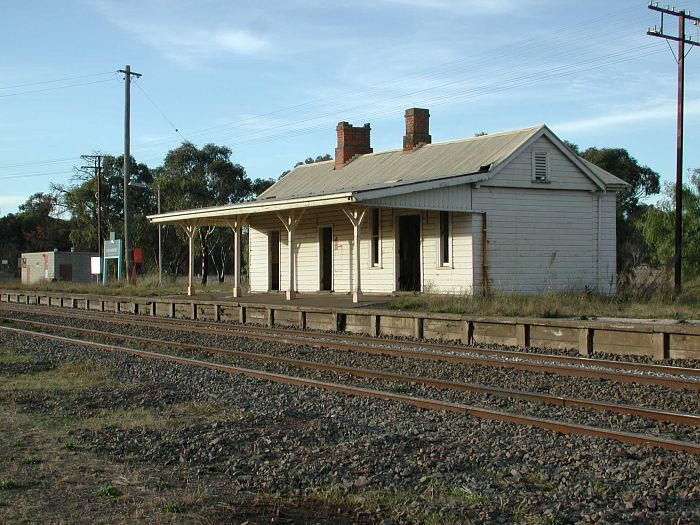 
The view of the station from the southern end.  Note the low height of the
wooden-faced platform.
