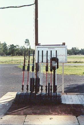
The lever frame with signal diagram behind.
