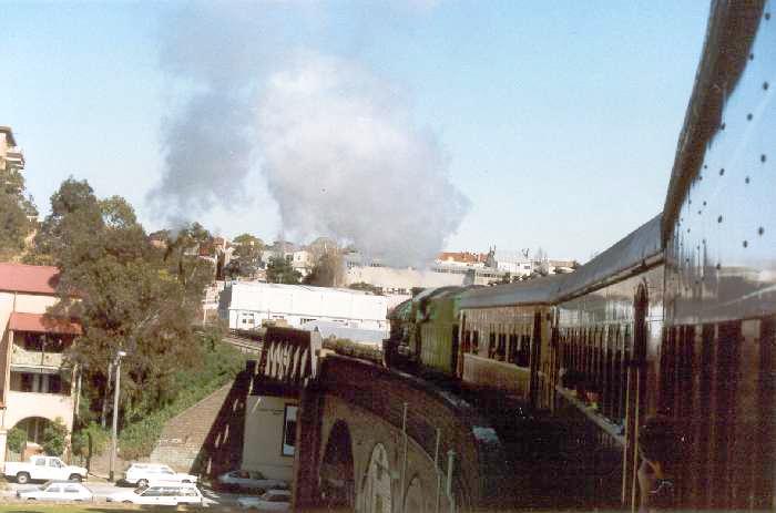 
A steam tour train is about to cross Johnston Street to the west of the
tunnel, heading towards Rozelle Yard.
