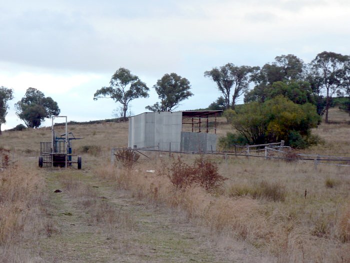 A view of a possibly rail-related structure adjacent to the line.