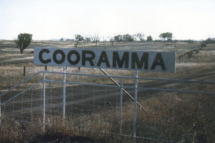 
The station nameboard hangs on a fence near the original station site.
