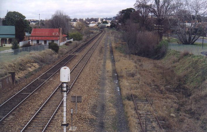 
Looking south towards Goulburn, the overgrown Crookwell line sits
on the right hand side.  The junction was just before the curve in the
distance.
