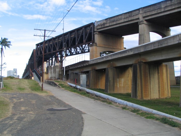 Road (above) and rail (below) converge at the northern end of the Grafton Bridge.