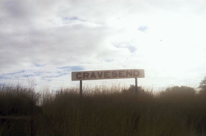 
The sign board is still present, in the long grass.
