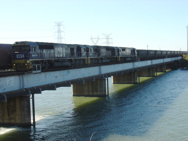 8234 8244 82XX crossing the Hunter River bridge near Hanbury North Junction.