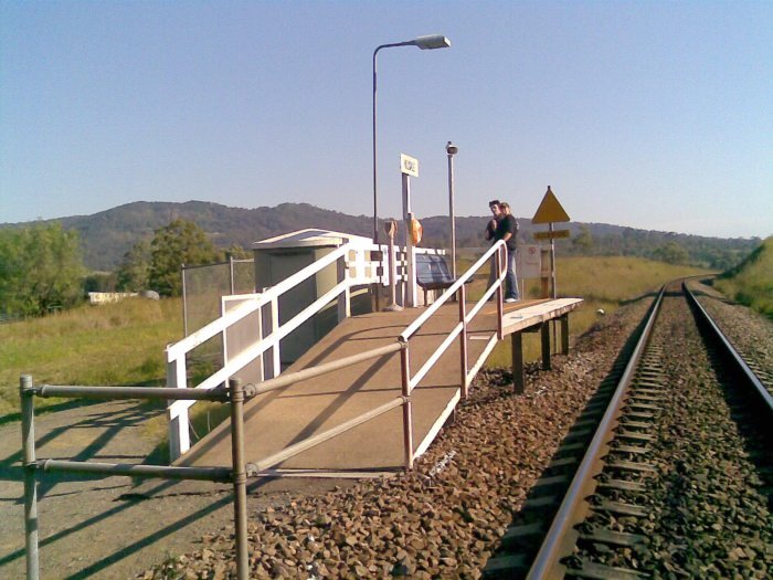 A closer view of the short platform, with some passengers awaiting the next Newcastle service.