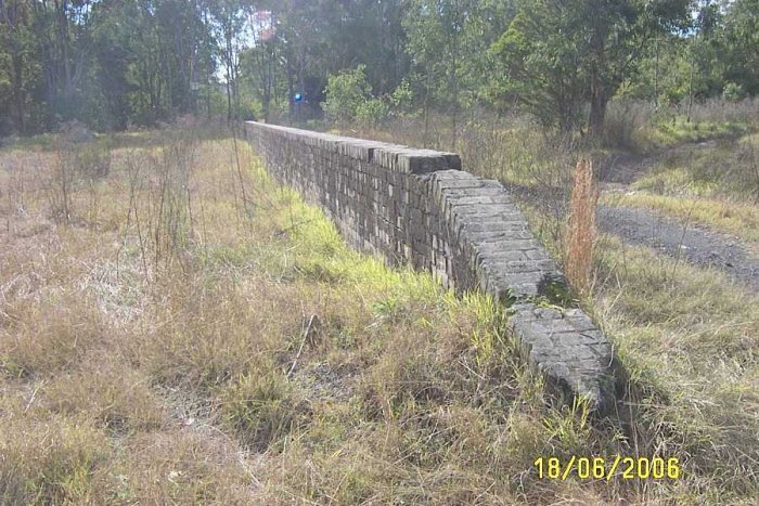 All that remains of the platform is the Brick Facing, the rail formation is to the right, looking towards Wallsend.