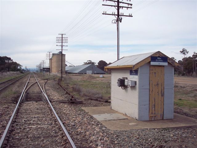 
The view of the location looking north.  The one-time station was located
on either side of the line, beyond the silos.
