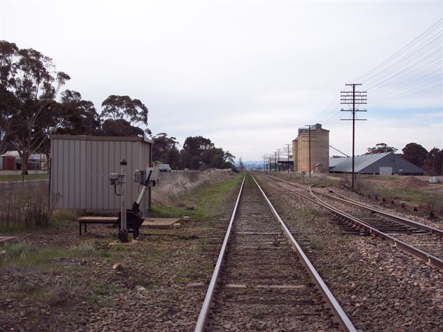 
The view looking north.  The one-time goods siding and shed were on the
left hand side of the line just beyond the hut.

