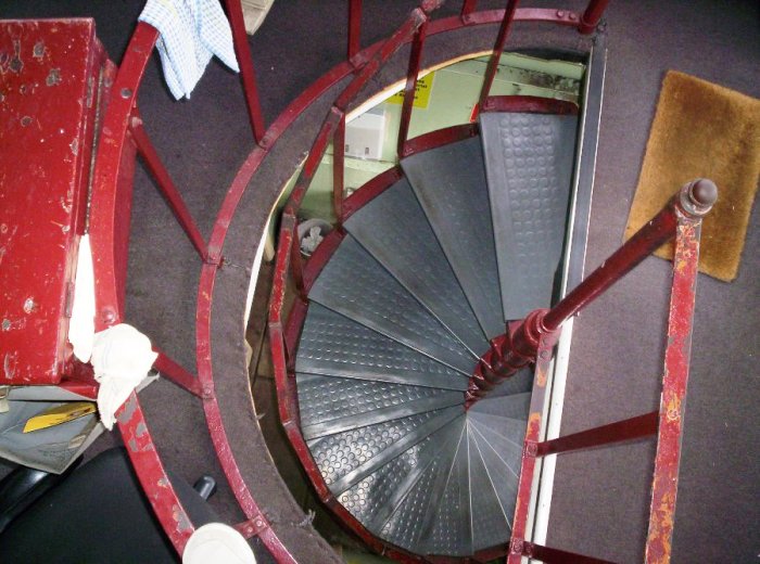 The view looking down the stairwell. The red box on the left is the staff box for the Goninans Branch, which has since been withdrawn.