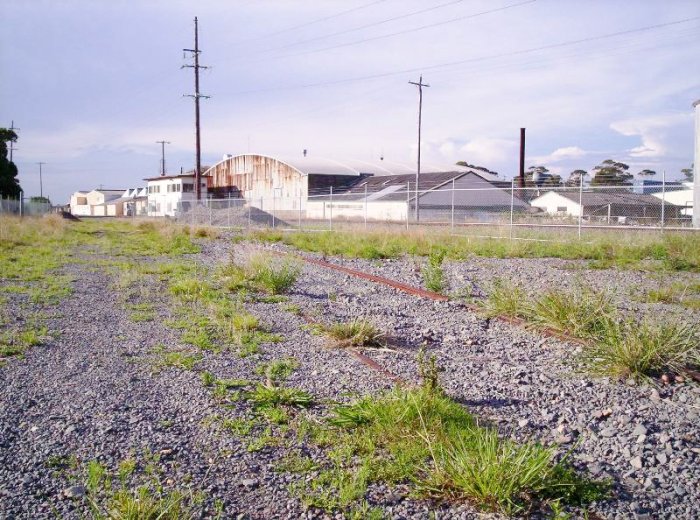 The one-time siding leading to the nearby gas works yard.  It is now disconnected from the main line.