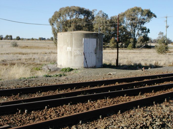 The plain concrete staff hut adjacent to the junction.