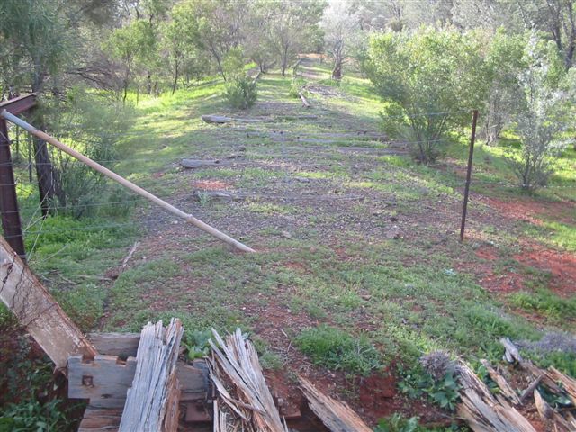 The remains of the branch line curving away as it enters private property.