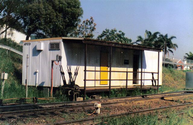 A photo of the Cooks River Yard master office with Frame 'A'. It was meant to be temporary But is still in used today (2007) as the yard master's office (Cooks River).  Frame 'A' has been removed with all points and signal now controlled from Sydenham signal complex.