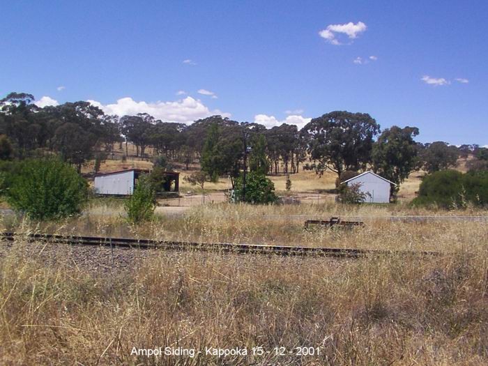 
The remains of the Ampol depot once served by a siding at this location.

