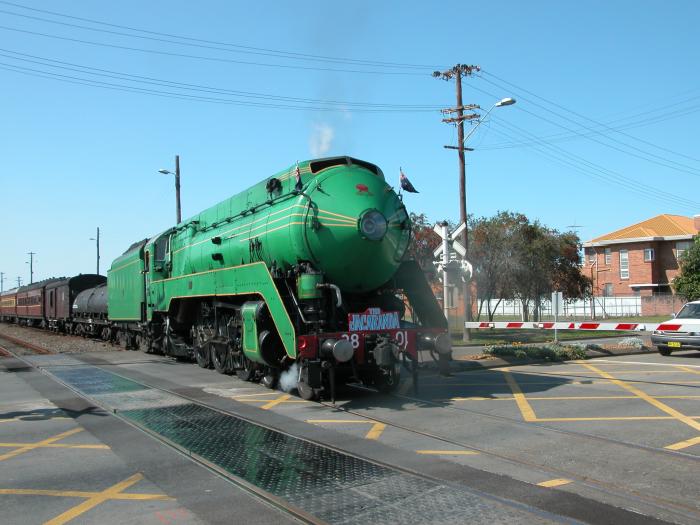 3801 and a tour train leaves the loop at Kempsey.