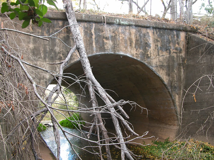 The crossing at Redbank Creek between Red Cutting and Kemsleys. This concrete bridge is the only remaining intact structure on the line.