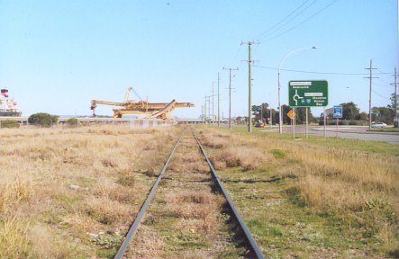 A view of the spur line from Kooragang Island branch taken alongside Cormorant Road and the intersection with Teal Street. 