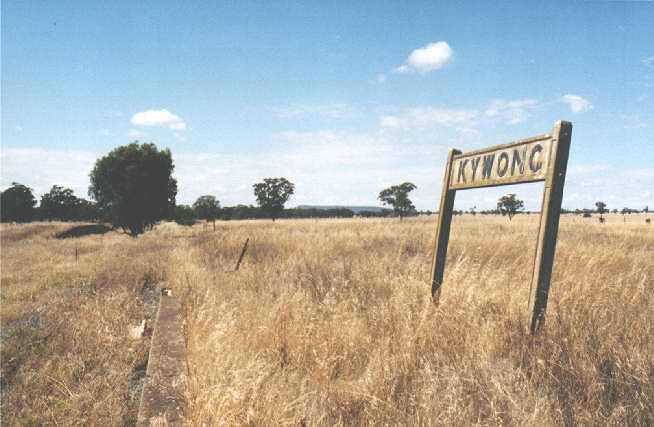 
The station sign looking back along the platform to Uranquinty. The loading
bank can be seen the in the left of frame in the middle distance.
