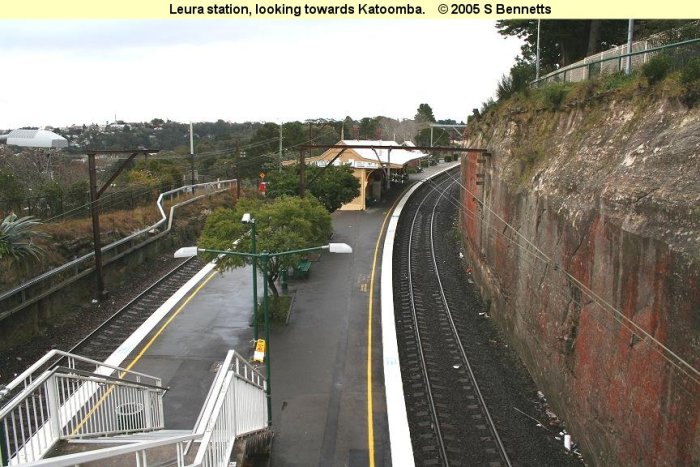 The view looking down from the footbridge towards Katoomba (westerly direction) which can be seen in the top left of photo. Platform 2 on left and Platform 1 and up main on right.