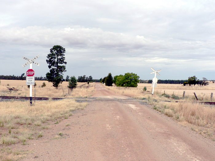 The view looking east towards the crossing adjacent to the station location.