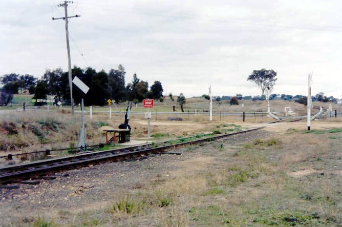 The view ooking towards Demondrille across the level crossing.