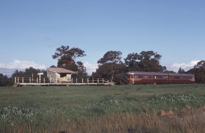 The platform and shelter are still present as railset 706 606 pass through.