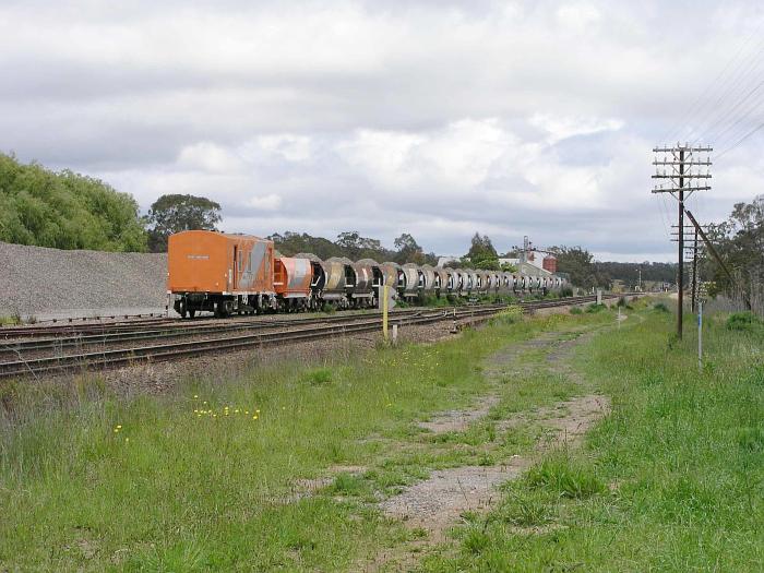 
A RIC ballast train sits in the goods siding to the north of the station.
