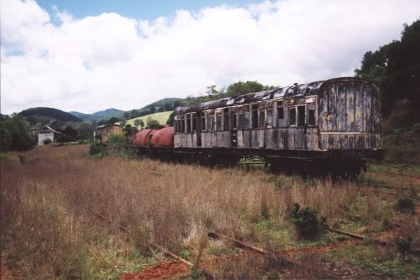 
The overgrown remains of the yard at Megan.  There is some rusting rolling
stock on one siding.
