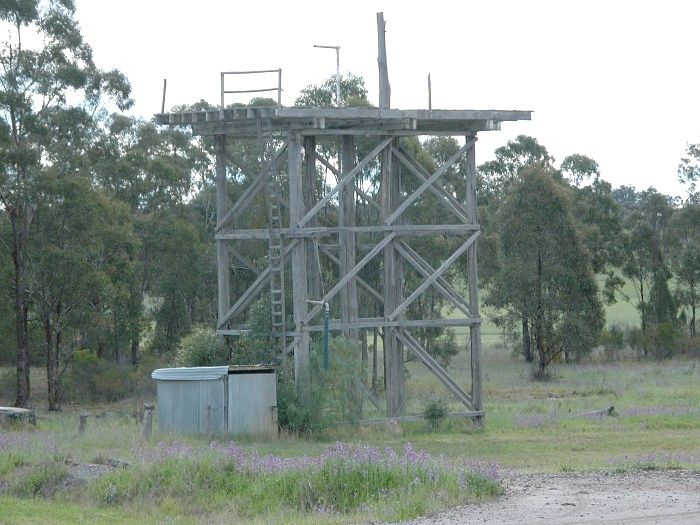 
The remains of the original water tank built in 1917. This tank was
replaced with the current steel tanks in 1926. No trace remains of
the locomotive yards and pits that were built alongside this tank.
