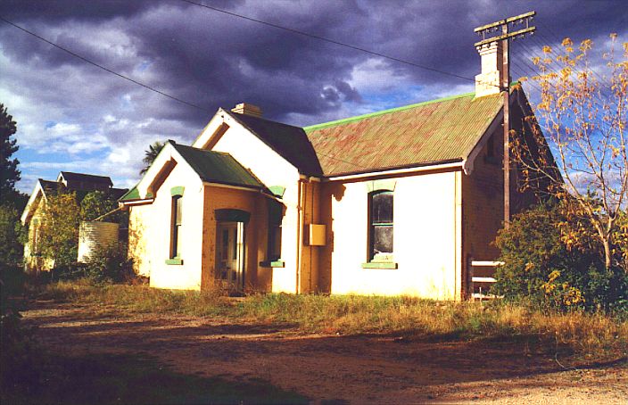 
The front of the station is basking in the late afternoon sunlight, as a
storm approaches.
