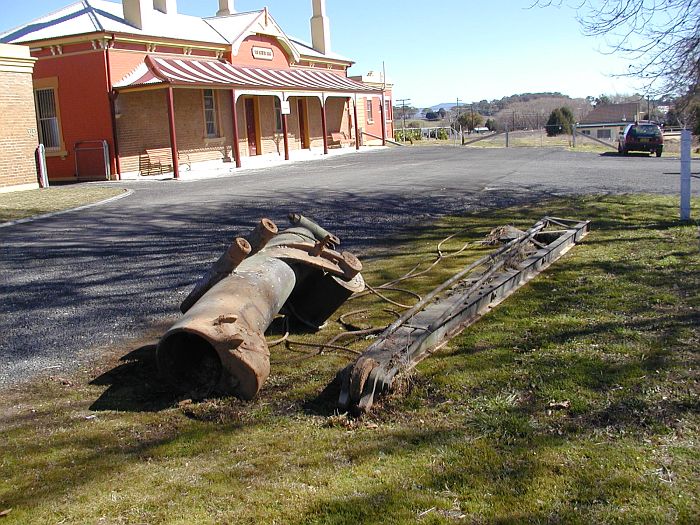 
Part of the uprooted crane lying in the carpark.
