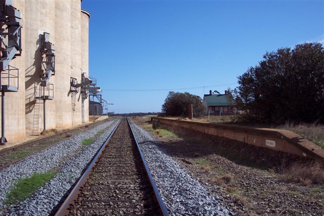 
Mirrool passenger platform. A sign halfway down the platform advertises the
football kick competition.
