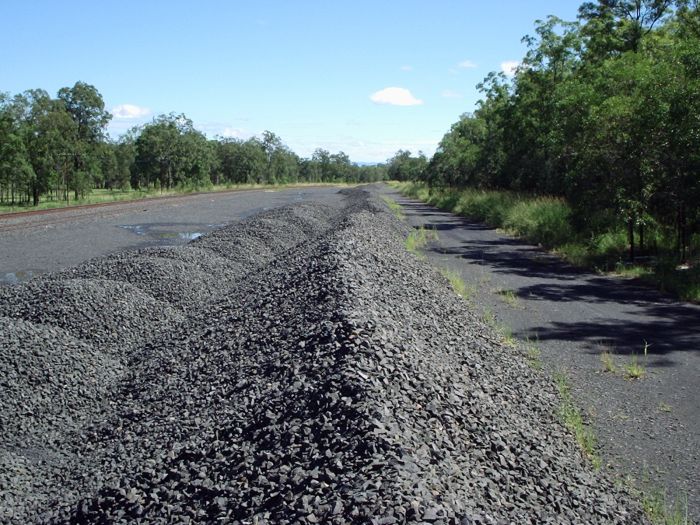 
A view of the large piles of ballast next to the siding.
