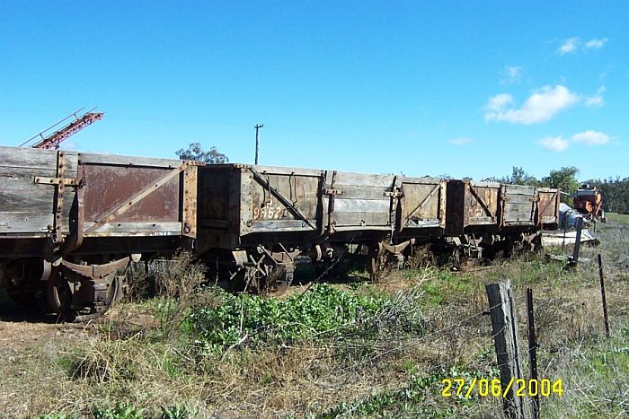 
Three more rotting S-class wagons in the adjacent sawmill siding.
