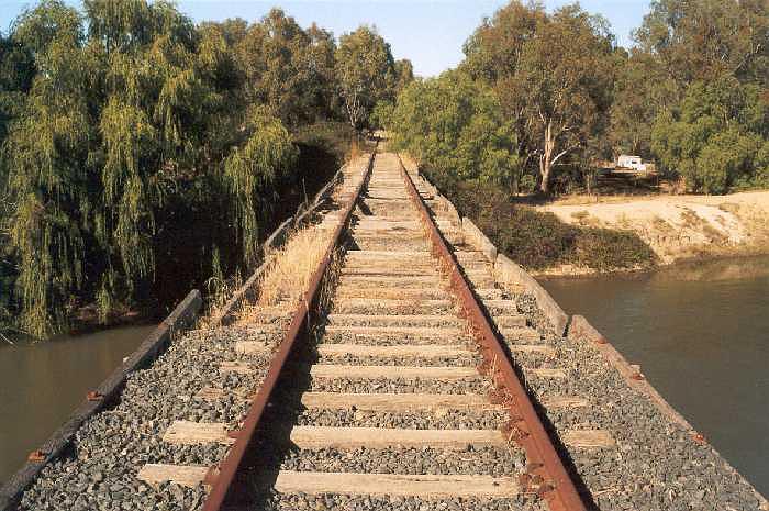 
The view looking south of the bridge over the Murrumbidgee Northern Canal
showing the deteriorating ballasted decking.
