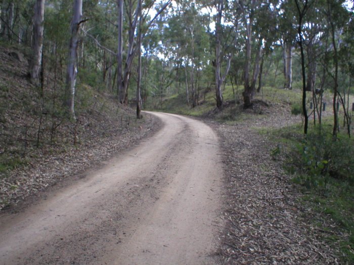 The line to the Oil Refinery curves through this cutting after leaving the station and heading round towards the Works 1km away.