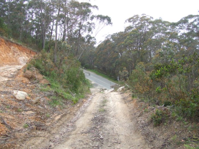 The view looking along the formation of Dargans Deviation where it it cut by the access road to Clarence Colliery.