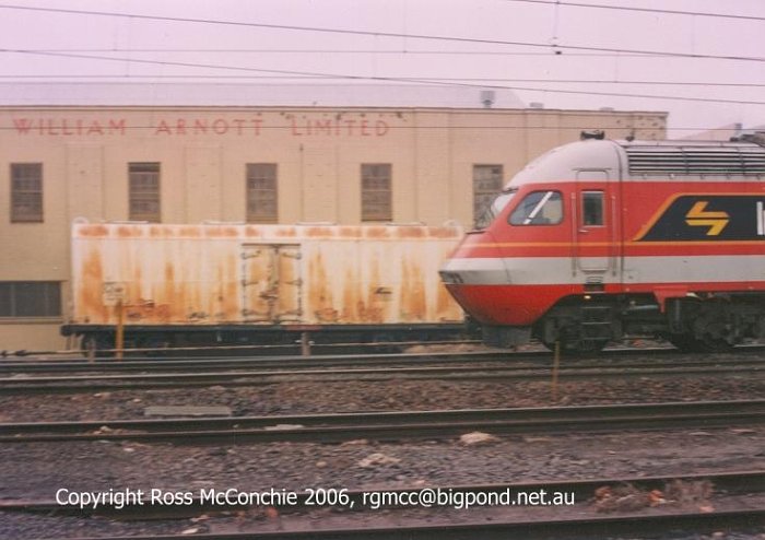 A van at Arnott's Biscuit factory as XPT passes.