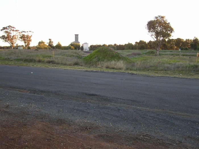 The view looking south-west at the former level crossing where the standard gauge line entered Oaklands yard. Beyond the mound the track has been converted to broad gauge.