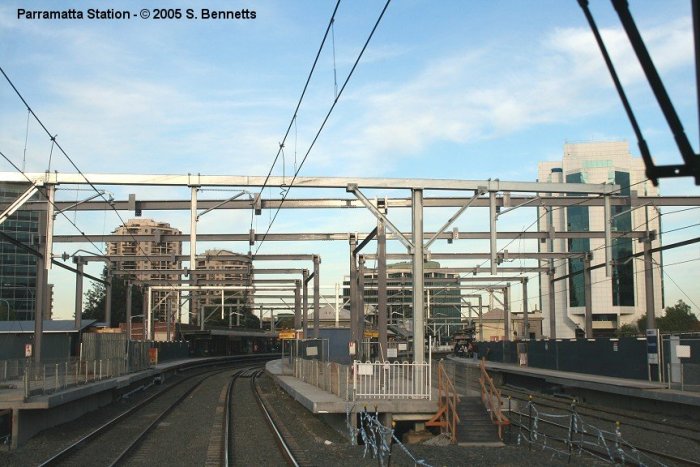 The view of construction work at the station from the rear of a west-bound service.