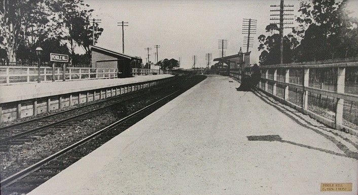 A photo of a photo taken circa 1924. Source of original photo is unknown, but has a small tag in the bottom right of photo reading: Pendle Hill C.1924 (1835) This photo is hanging in a frame in the Station Masters office.