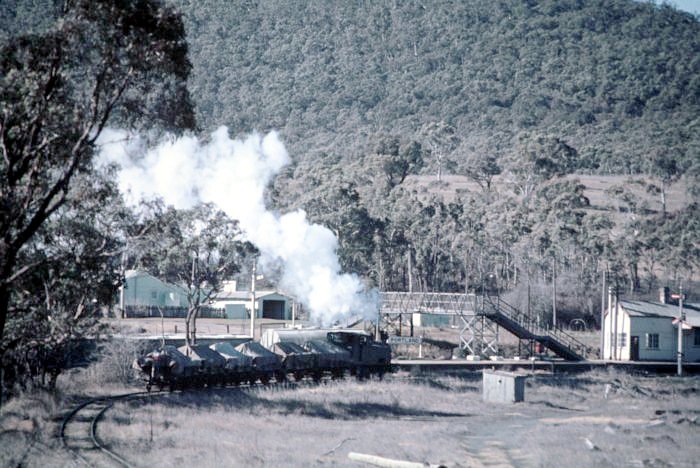 Portland station viewed from the town direction. A loaded train from the cement factory is arriving at the station from the Commonwealth Portland Cement Company's branch.