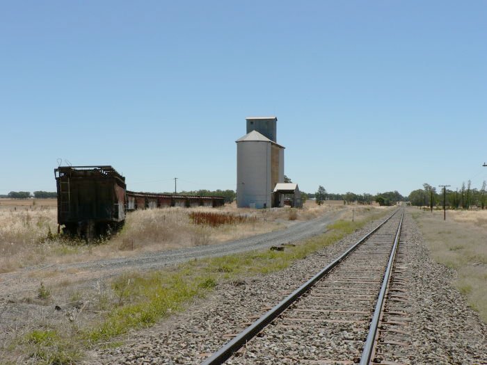 The view looking west through the location.  The one-time statio was located on the right of the track in the middle distance.