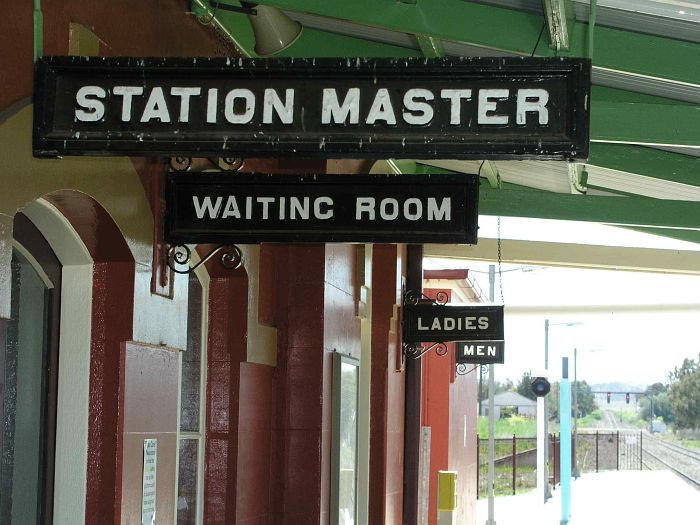 
Various signs along the station platform.
