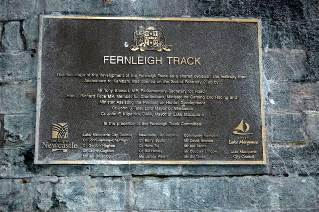 A plaque commemorating the opening of the rail trail in 2003.