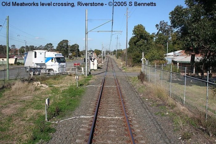 The unprotected level crossing into the old Meatworks site at the Richmond end of Riverstone station, now used by Roadmaster. Trains are sometimes forced to slow down when trucks approach level crossing as the trucks sometimes try to beat the train. The truck pictured pulled up hard as we approached as if he realised he would not be able to beat train.