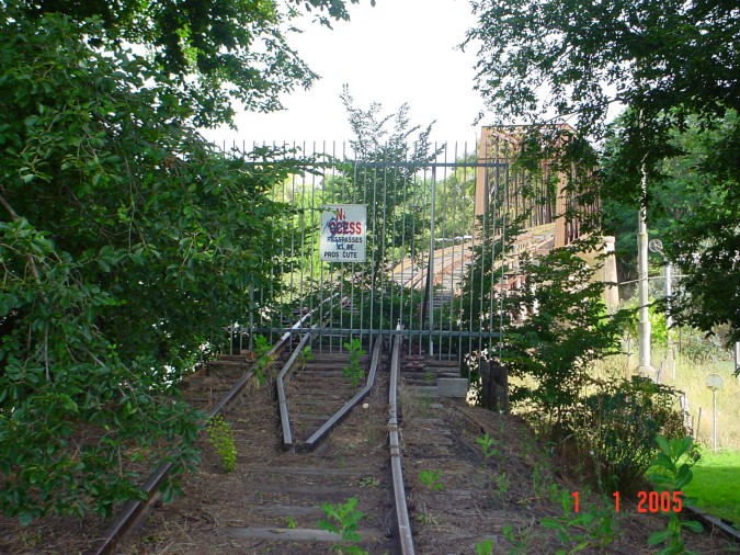 
A close-up of the fenced-off entrance the to bridge.
