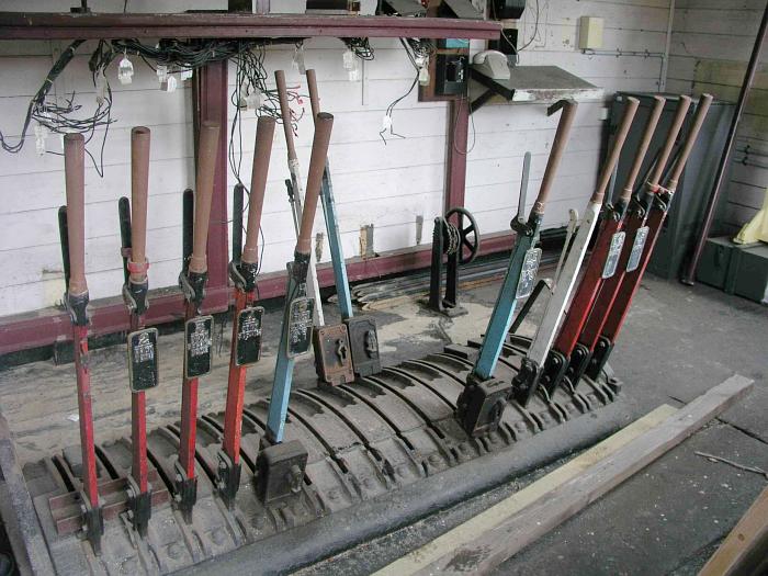 
The mostly-gutted signal box still contains a 12-lever frame.
